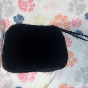 black fur hand wristlet bag